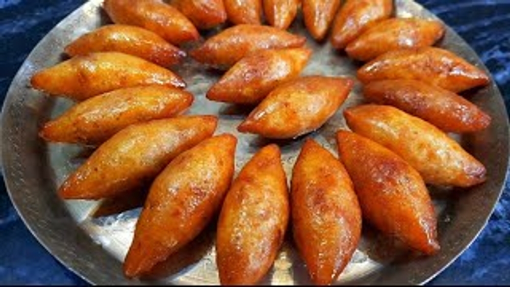 img of মুগ পুলি পিঠা
